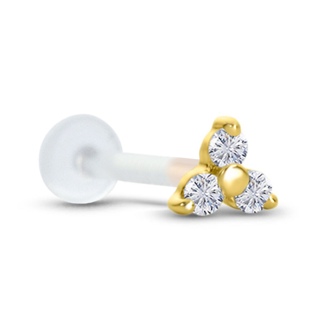 bioflex push pin labret stud featuring a yellow gold trinity design