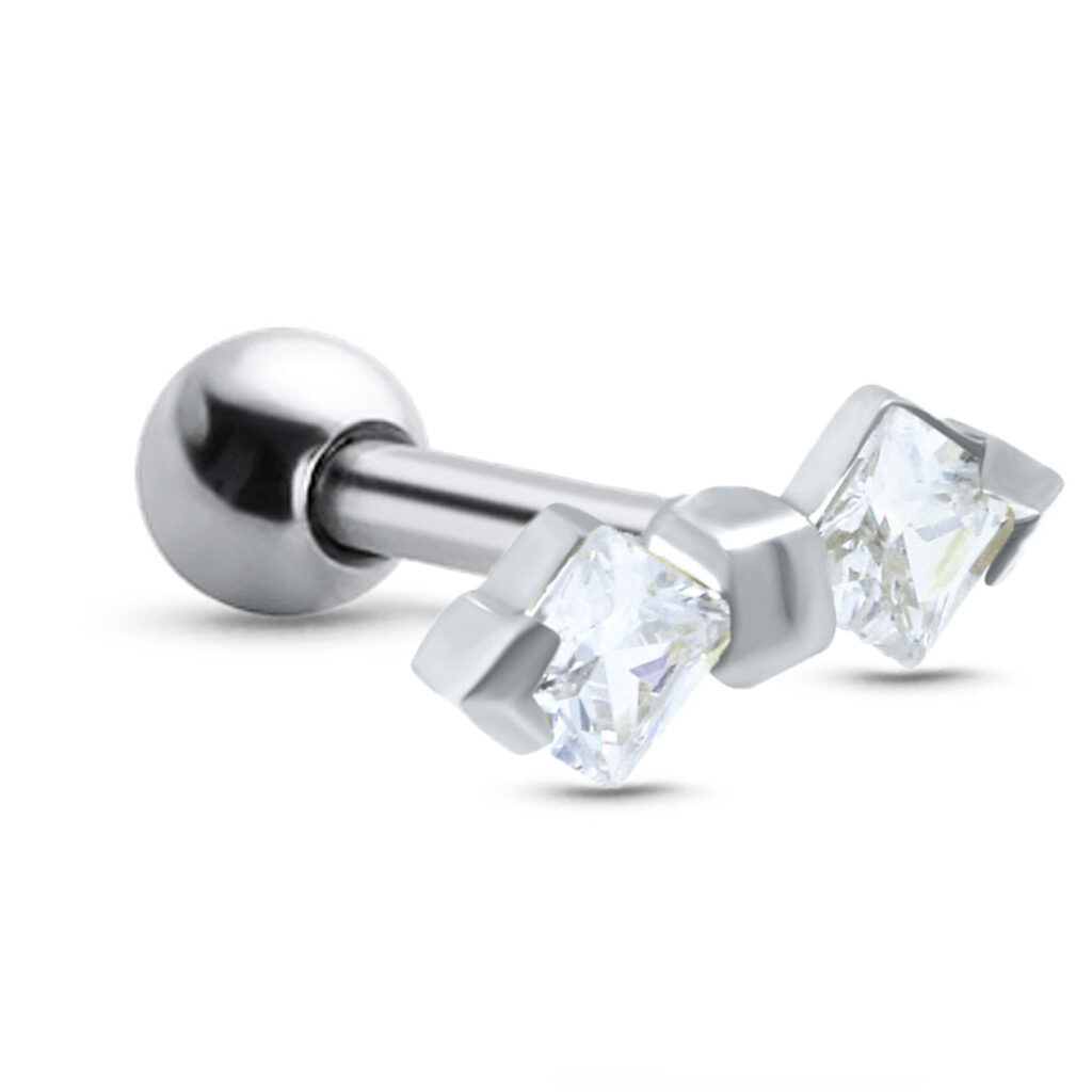 surgical steel ear cartilage stud featuring a bow design with clear stones