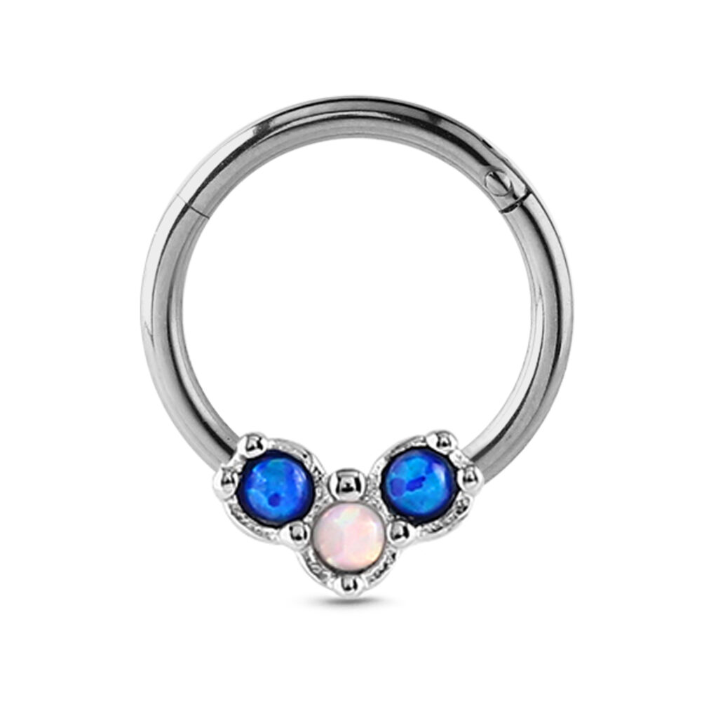 surgical steel hinged septum clicker with a triple faux opal design featuring a center white stone and 2 blue stones on either side