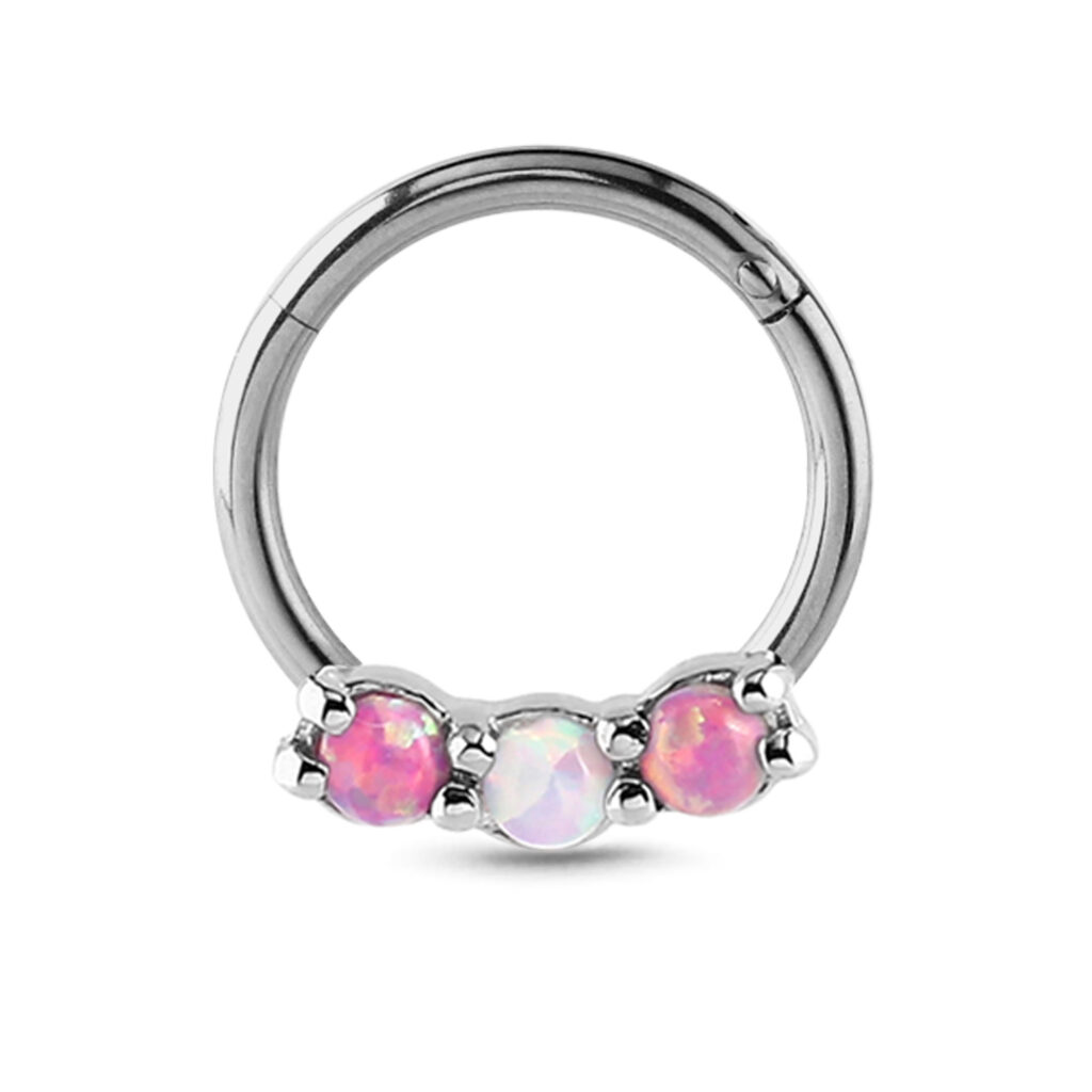 surgical steel hinged septum clicker featuring 3 faux opal stones; 2 pink and 1 white