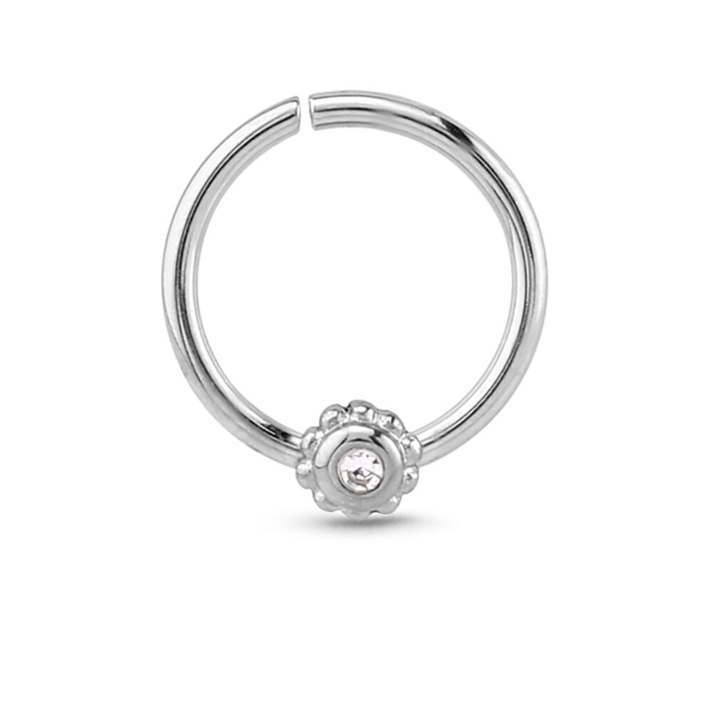 surgical steel seamless hoop with a flower design with a clear stone
