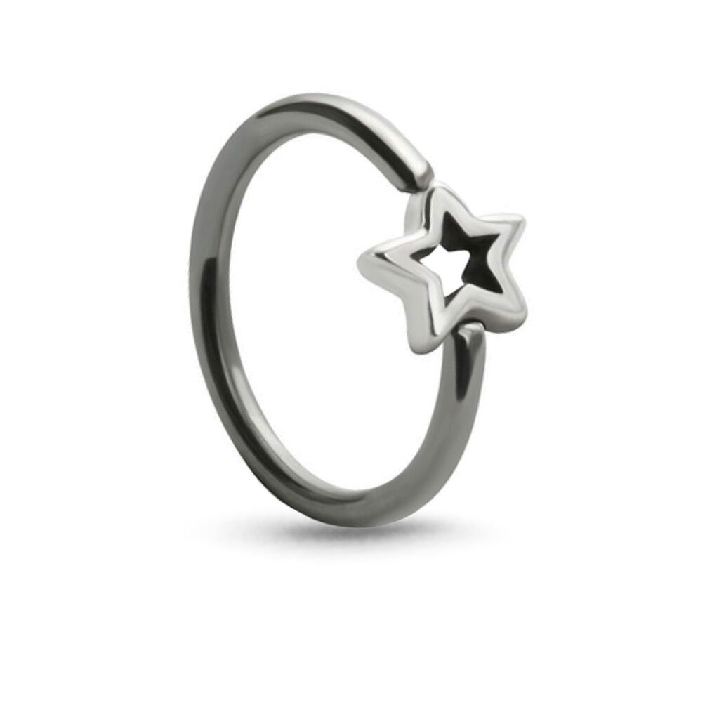 titanium captive hoop with a center star charm