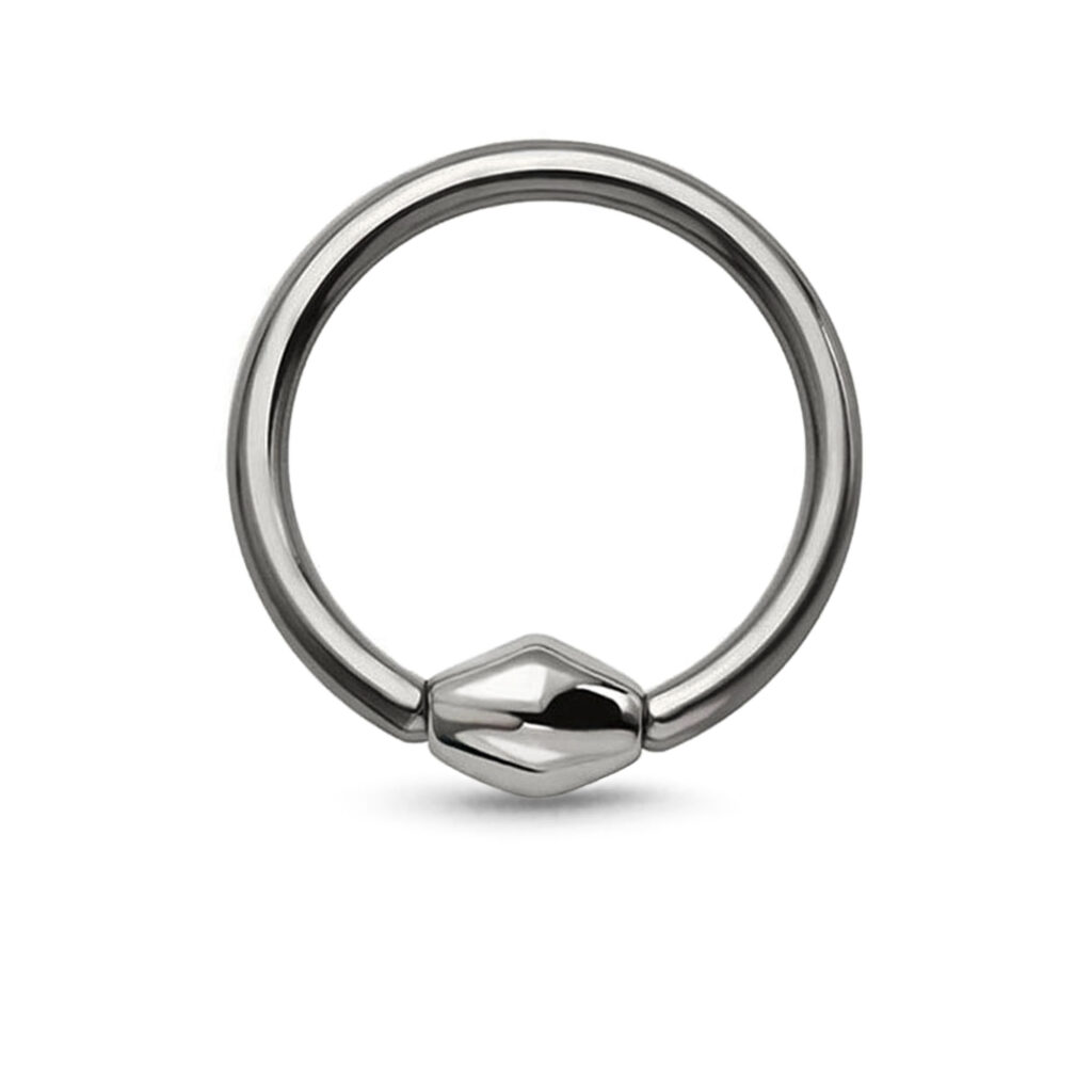 titanium captive hoop with a center bicone charm