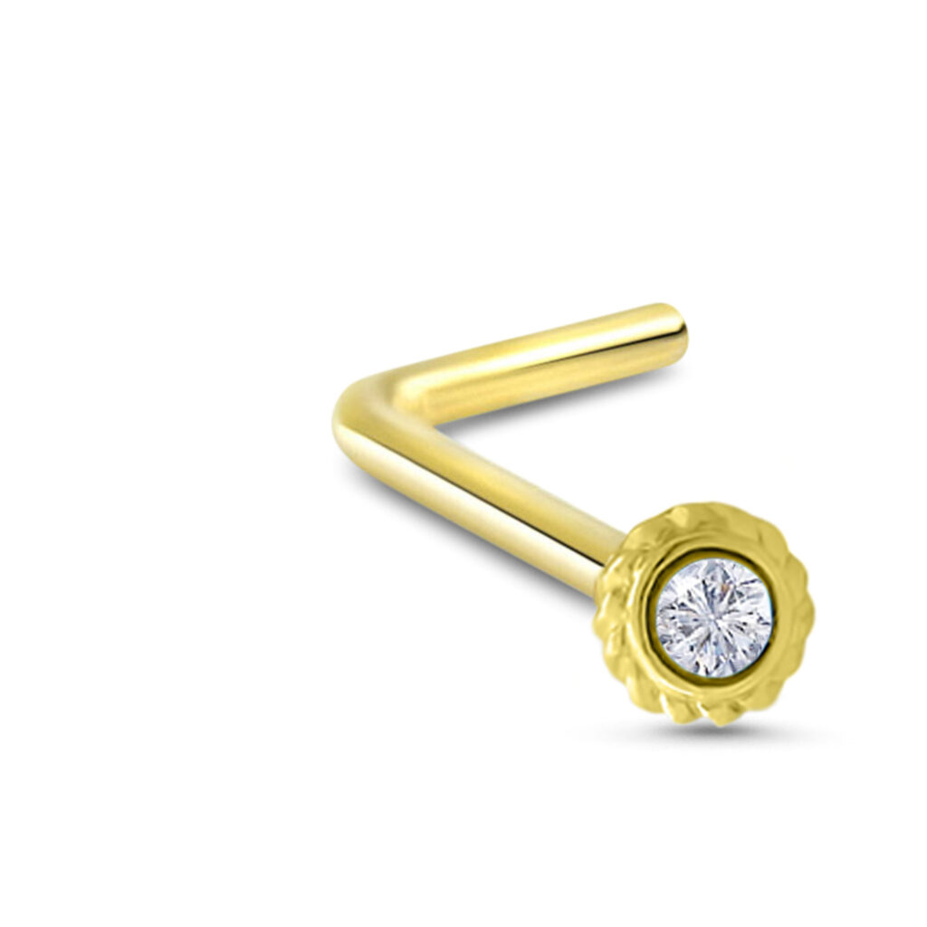 yellow gold lbend nose stud featuring a flower design with a clear center stone